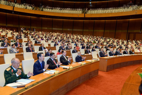 Các đại biểu Quốc hội tại phiên khai mạc kỳ họp thứ 11, Quốc hội khóa XIII diễn ra sáng 21-3.
