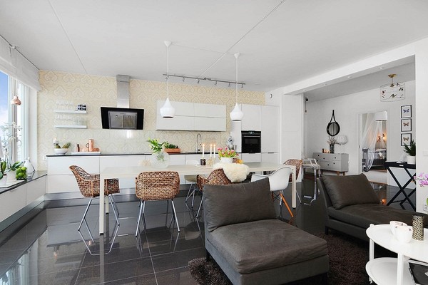 Thiết kế không gian mở nối liền phòng khách với khu vực nhà bếp của căn hộ.