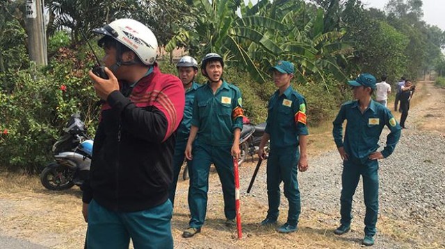 Dân quân và lực lượng chức năng đang có mặt tại khu vực nông trường Phạm Văn Hai