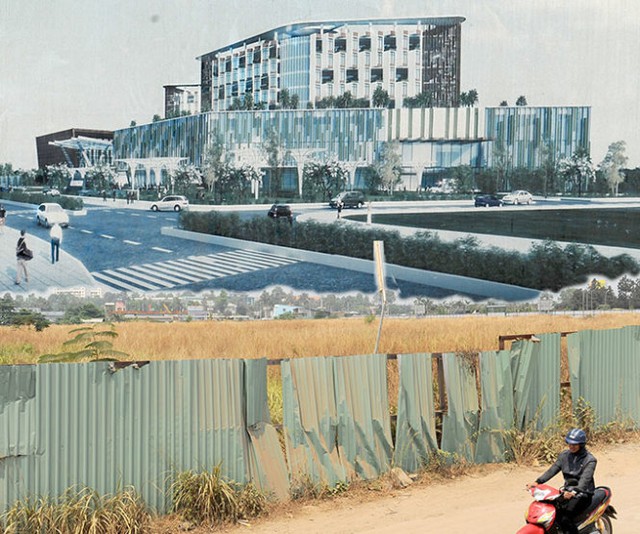 
Bệnh viện Ung bướu cơ sở 2 ở Q.9, TP.HCM vẫn là miếng đất trống bỏ hoang (ảnh dưới), trong khi kế hoạch ban đầu hoành tráng như bản vẽ (ảnh trên) là chậm nhất phải đưa vào sử dụng năm 2013 - Ảnh: Tự Trung
